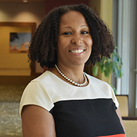 Portrait photograph of Natoya Haskins