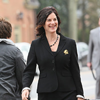 Katherine Rowe walking down a street