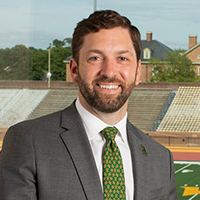 Brian Mann standing inside Zable Stadium 