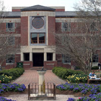 The entrance to Swem Library with part of the sundial area in front of it