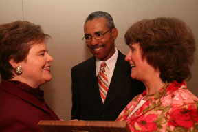 (From left) De玛丽, Cannaday and McLaughlin confer during the award presentation. By Stephen Salpukas.