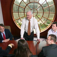 Dick Ash leads a mentoring group