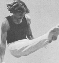 Fergusson performing on the high bar/Colonial Echo
