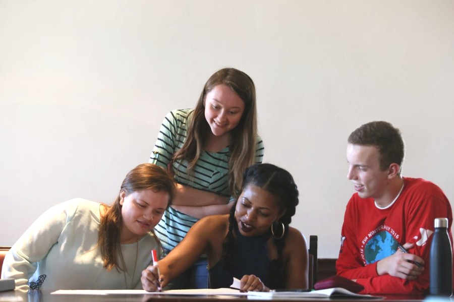 Aim 4 students working on a project