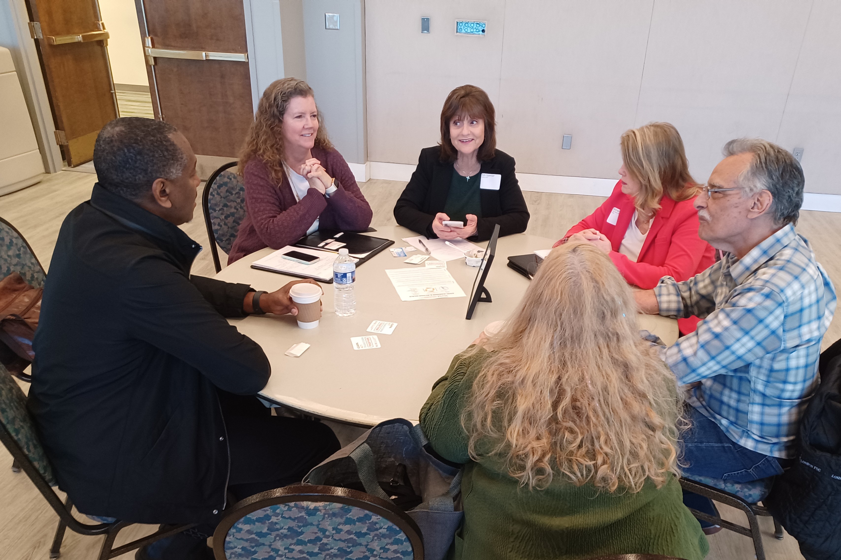 community representatives in a discussion