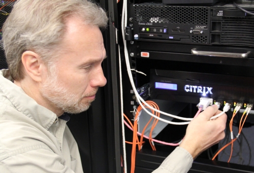 Clarke Morledge checks the primary load balancer.  This is the main point of entry for information coming in to the W&M network.
