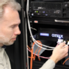 Clarke Morledge checks the primary load balancer. This is the main point of entry for information coming in to the W&M network.